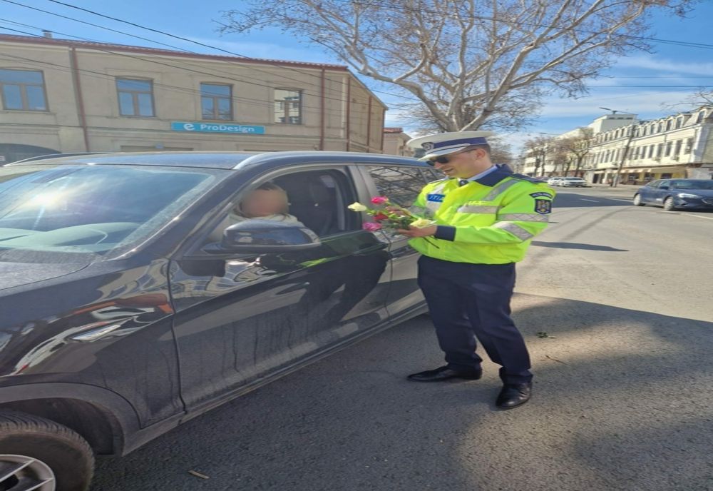 Misiune cu flori în trafic