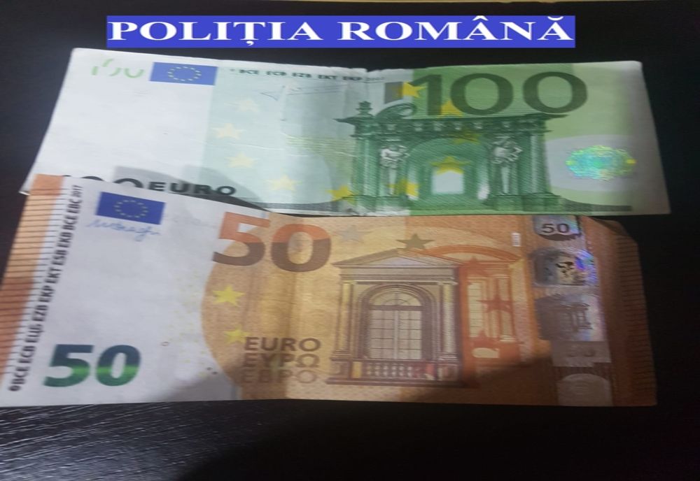 Percheziții într-un dosar de falsificare de monede