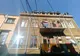 Peretele unei clădiri, afectate luna trecută de un incendiu, s-a prăbușit astăzi după amiază